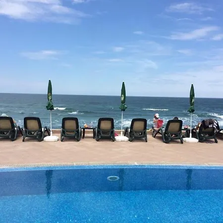On The Beach In Апартамент